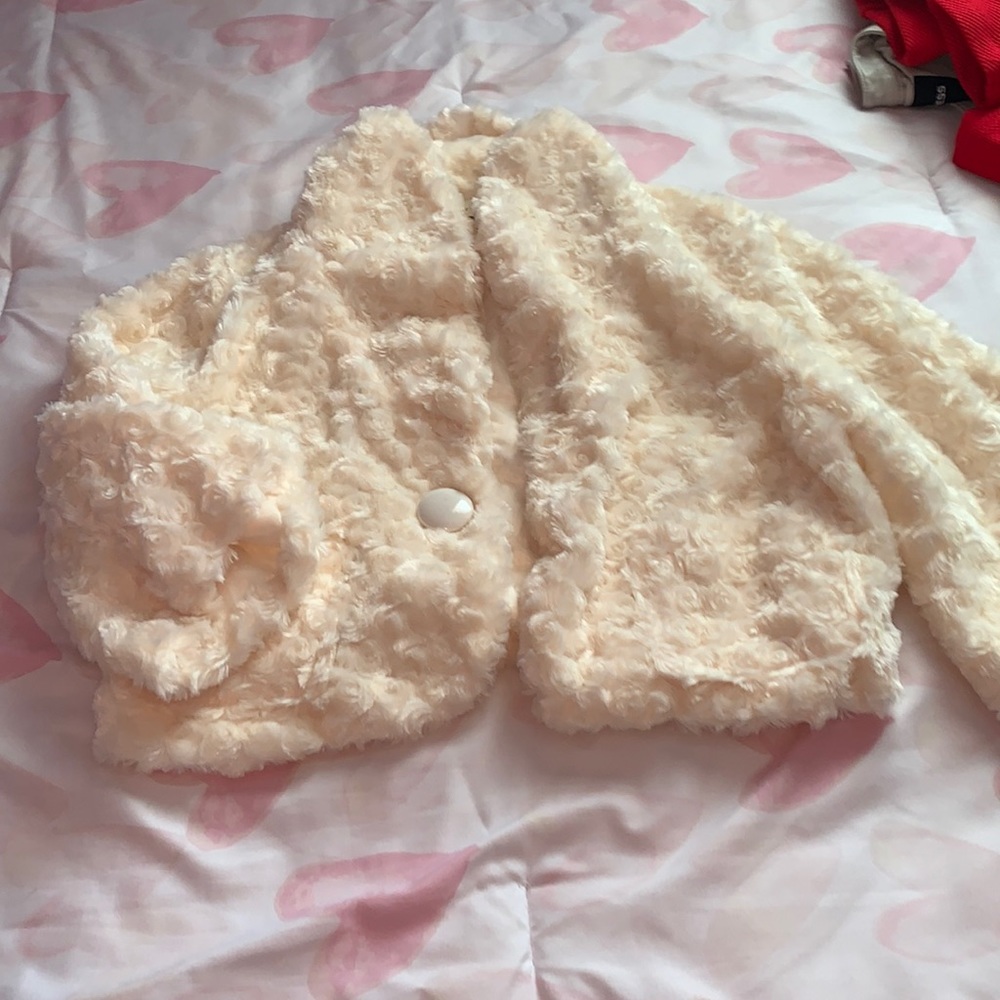 Selling this cute little coat??